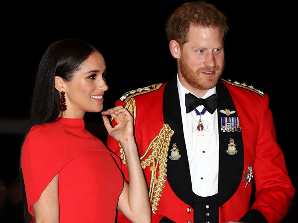 Meghan and Prince Harry turn heads in matching red outfits at the Royal Albert Hall Event