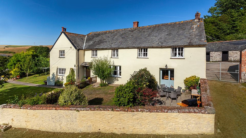 Grade II-listed farmhouse next to one of Britain's best surfing beaches goes up for sale for £1.7m