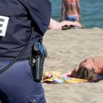 French minister defends topless sunbathing calling it 