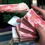Rupee breaches 202 a dollar barrier in interbank