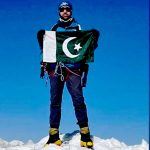 Pakistan’s Abdul Joshi puts his country’s flag on Mount Everest