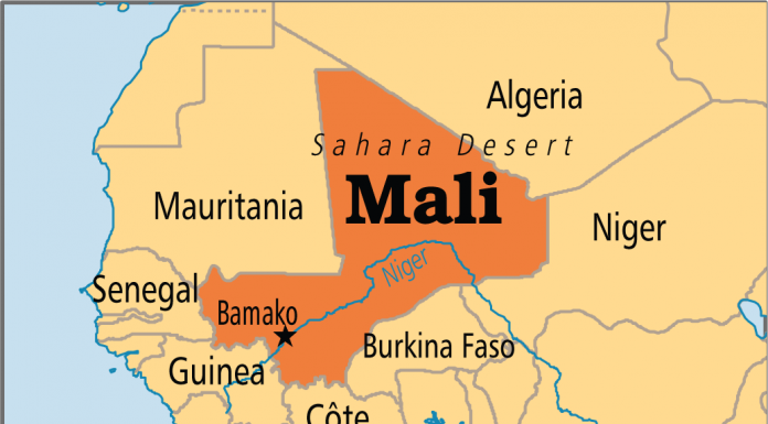 Passenger bus hits a roadside bomb in central Mali; 6 dead