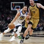 Curry leads Warriors past Raptors for 8th straight road win