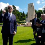 Biden honors US war dead with a cemetery visit ending a French trip